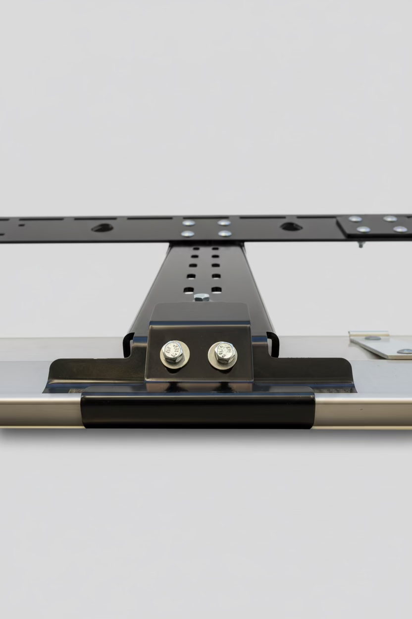 Close-up of a metal bracket on a white background